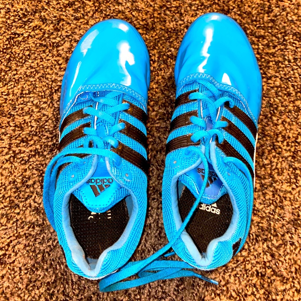 Lightning blue Nike spikes